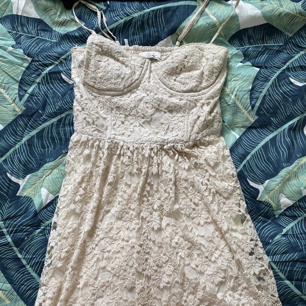 Cream colored, lace dress